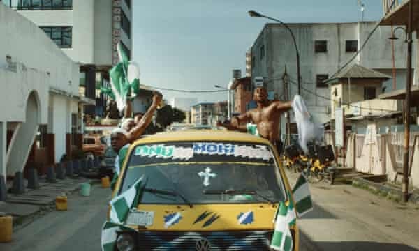 A still image of Nigerian fans in Lagos celebrating in the Super Eagles 96 documentary