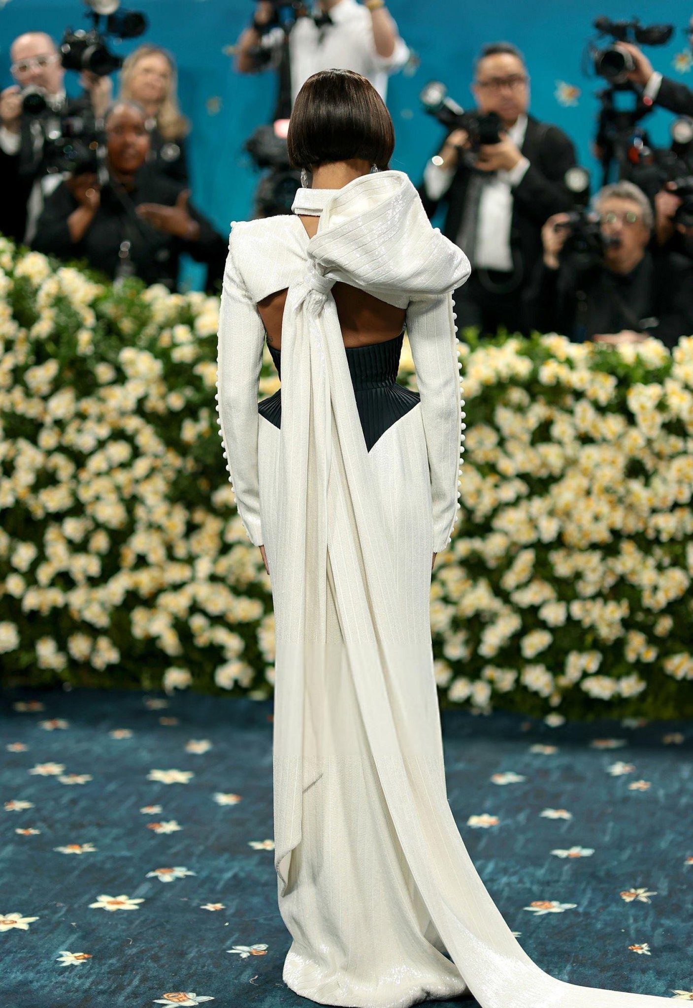 Zoe Saldaña wears Thom Browne and Cartier