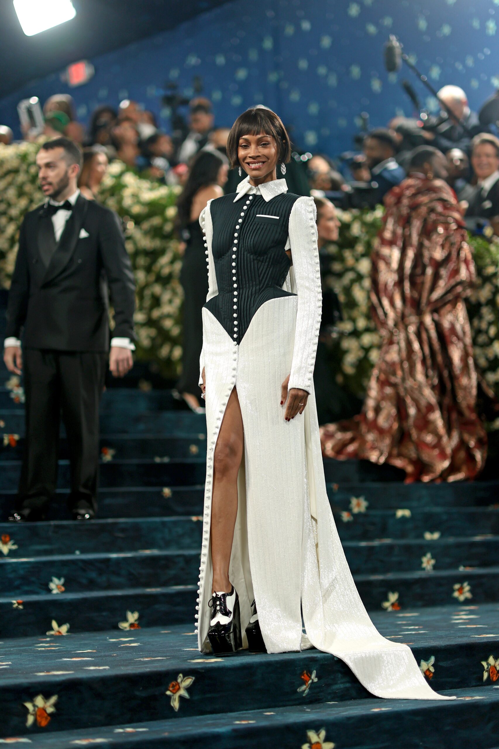 Zoe Saldaña wears Thom Browne and Cartier
