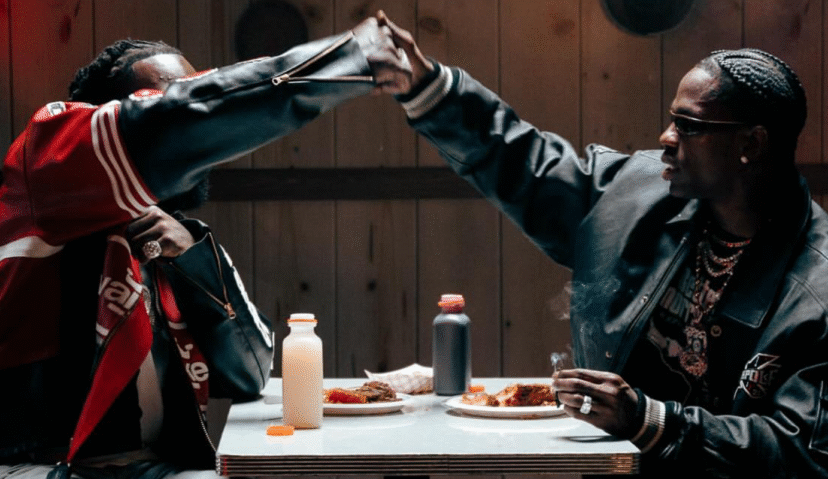Burna Boy and Travis Scott Throw a Warehouse Party in "TaTaTa" Video